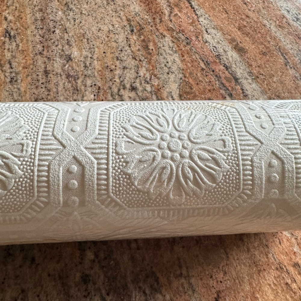 Elegant Cream Textured Wallpaper